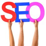 Hands showing letters as the word of SEO.